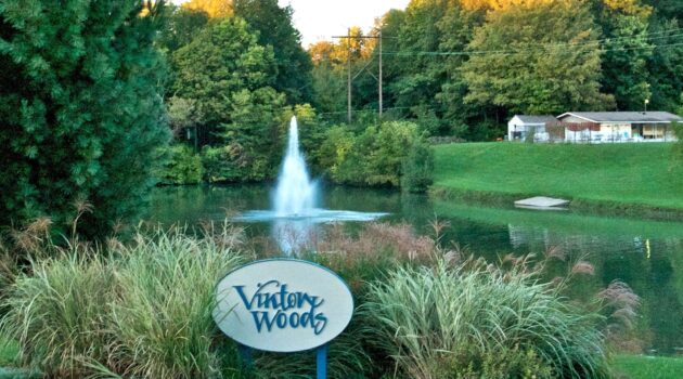 View of Vinton Woods pond and clubhouse in the background