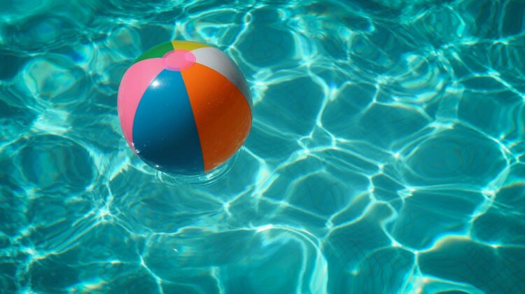 beach ball floating in a pool